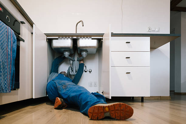 Professional Drain Cleaning technician working in Middle Village, NY